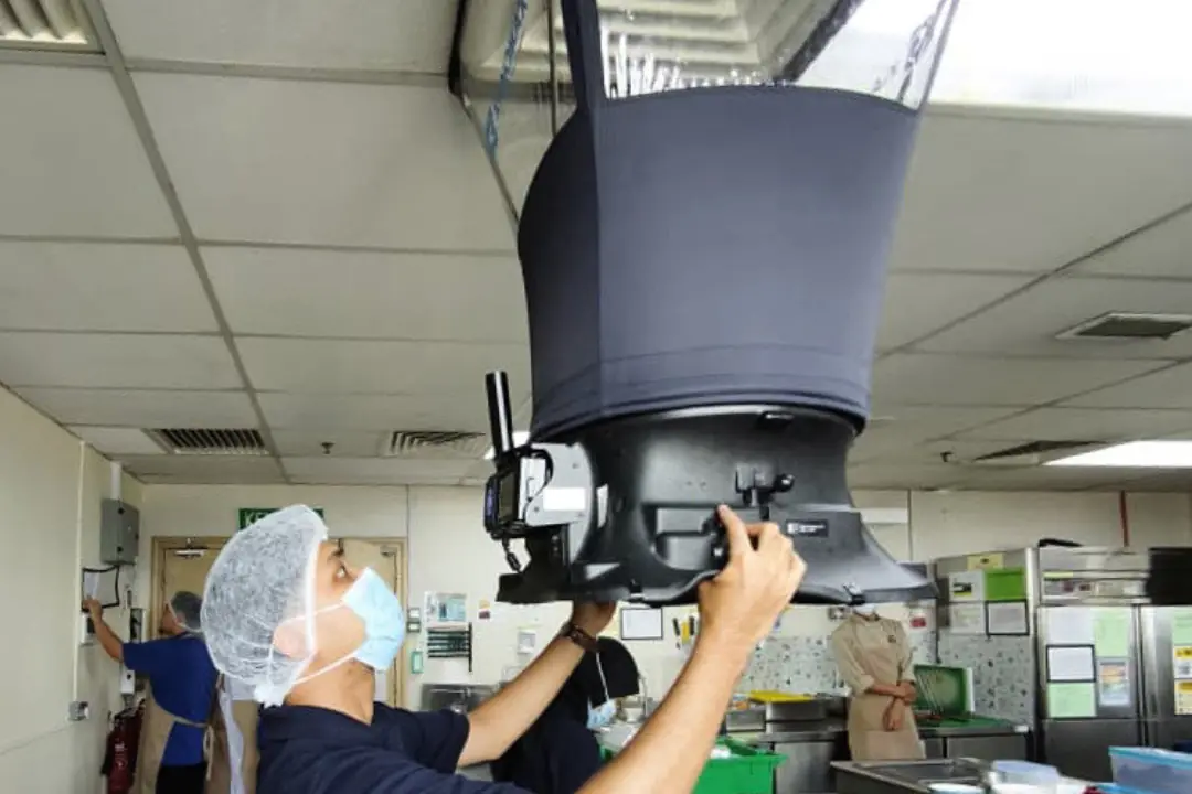 Airscan IAQ team testing the airflow